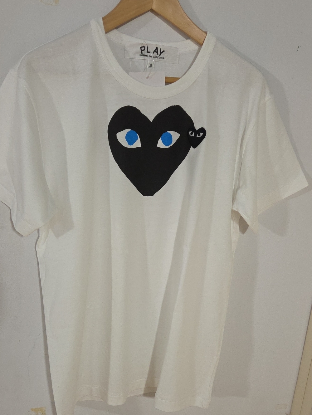 Comme des Garcons White Tee with Black Heart and Blue Eyes Graphic